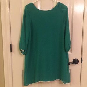 Green bow back dress